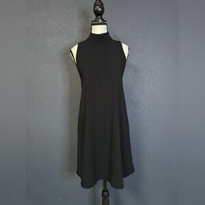 Alice + Olivia Black Sleeveless Mini Dress w/ Back Cut out -
Fits like M